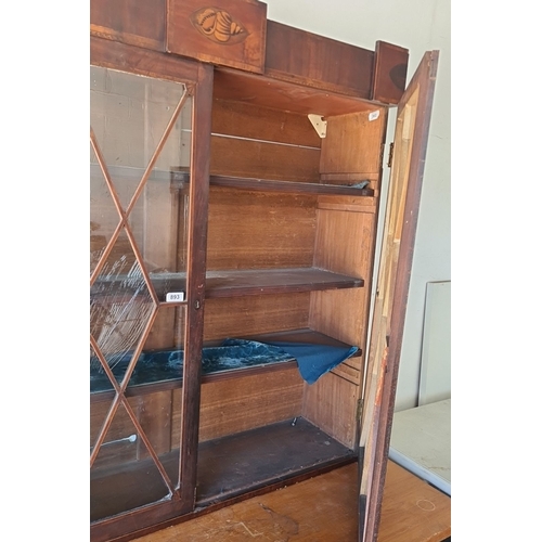 893 - Antique Georgian mahogany display cabinet with glass-paneled doors and carved seashell motif. It was... 