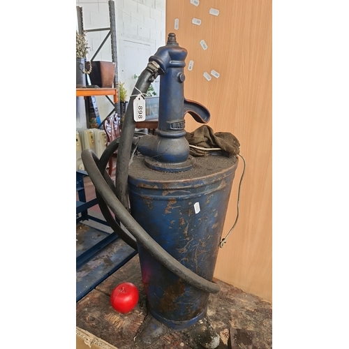 898 - Vintage blue hand-operated oil pump with hose, marked 