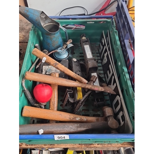 904 - Assorted tools lot, including vintage metal oil can, hammers, car jacks, and license plates.