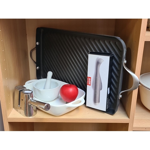 924 - Kitchenware collection includes Alessi ginger grater, mortar and pestle, grill pan, sauce boat.