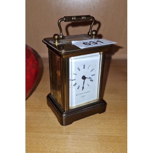 631 - Star Lot : An Antique  Matthew Norman brass carriage clock, with a Roman numeral dial and mechanical... 