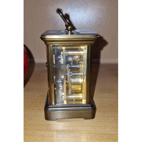 631 - Star Lot : An Antique  Matthew Norman brass carriage clock, with a Roman numeral dial and mechanical... 