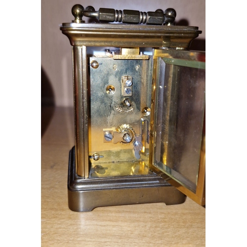 631 - Star Lot : An Antique  Matthew Norman brass carriage clock, with a Roman numeral dial and mechanical... 