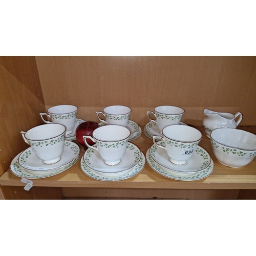 634 - Set of Royal Tara fine bone china teacups, saucers, creamer, and sugar bowl with shamrock pattern, m... 