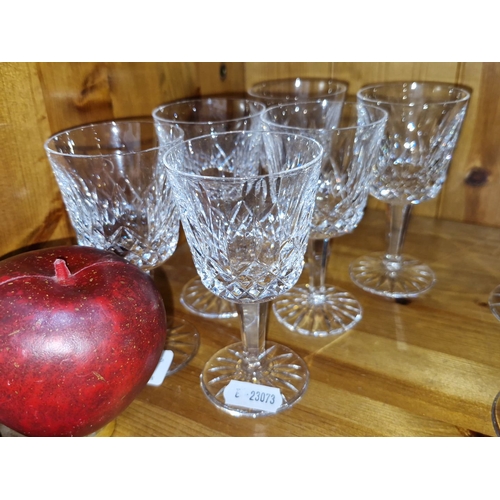 641 - Set of six Waterford  cut crystal wine glasses featuring intricate diamond and starburst patterns.