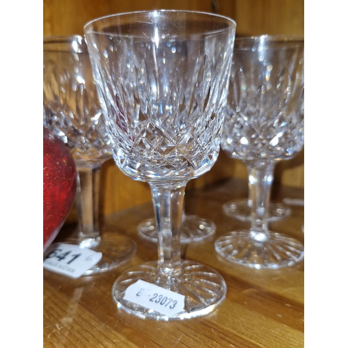 641 - Set of six Waterford  cut crystal wine glasses featuring intricate diamond and starburst patterns.