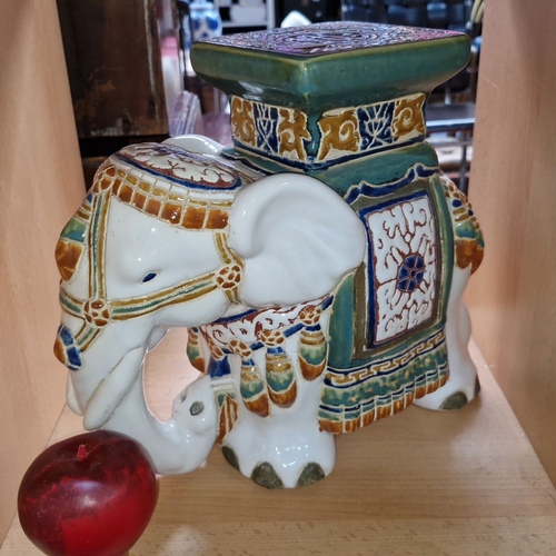 651 - Antique ceramic elephant figurine, intricately hand-painted with vibrant colors and ornate details, ... 