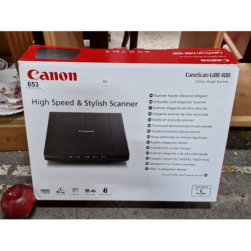 653 - An as new Canon CanoScan LiDE 400 Colour Image Scanner features high speed, stylish design, 4800 x 4... 