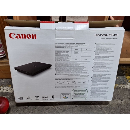 653 - An as new Canon CanoScan LiDE 400 Colour Image Scanner features high speed, stylish design, 4800 x 4... 