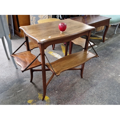 674 - Star Lot : A super fold down table features a curved rectangular top and 4 fold down sides for addit... 