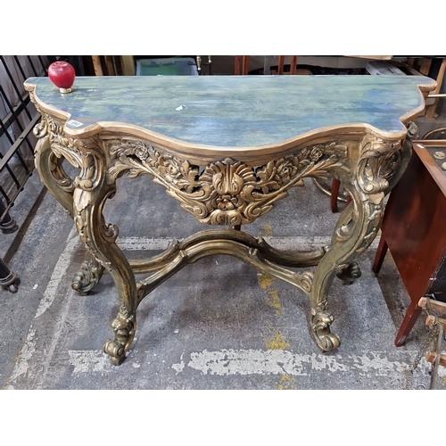 692 - Star Lot ; A very ornate French console table with intricately hand carved floral and scroll details... 