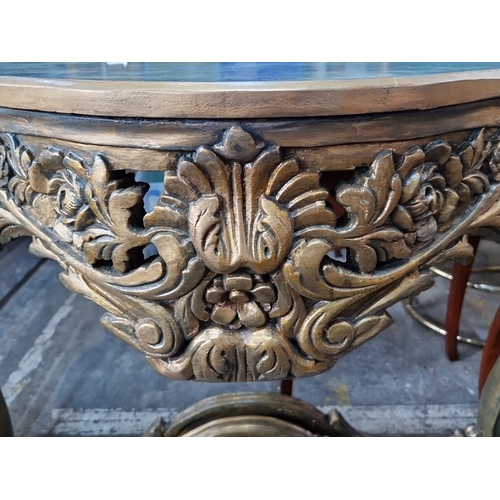 692 - Star Lot ; A very ornate French console table with intricately hand carved floral and scroll details... 