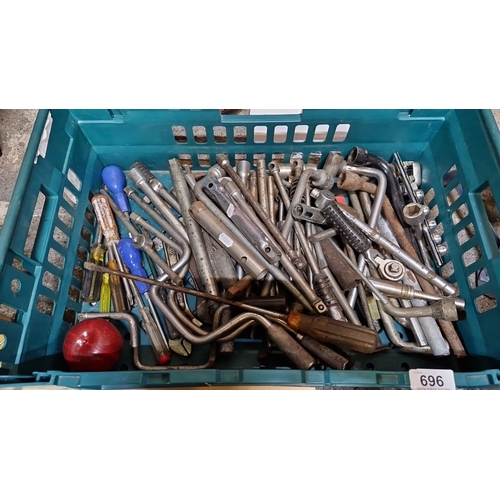 696 - Mixed lot of assorted metal hand tools, including various screwdrivers, wrenches, and socket handle ... 