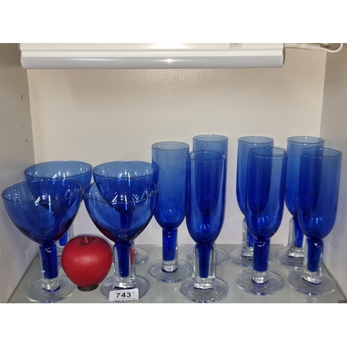 743 - 11 Bristol blue champagne flutes and wine glasses.