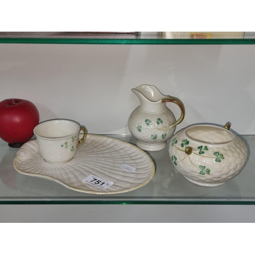 751 - Four lovely pieces of vintage Belleek including sugar bowl, creamer, cup and elaborate sandwich plat... 