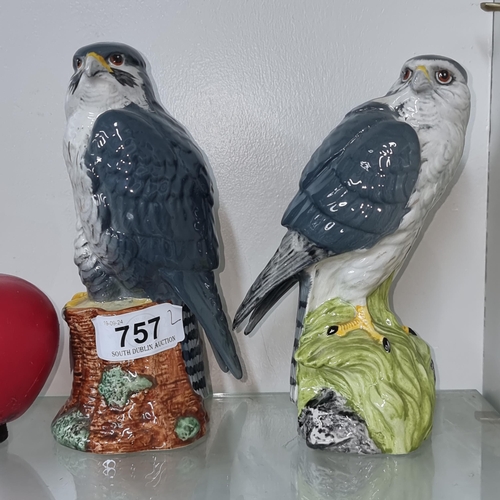 757 - A pair of Royal Doulton Whyte & Mackay Scotch Whisky 200ml decanters in the form of a peregrine falc... 