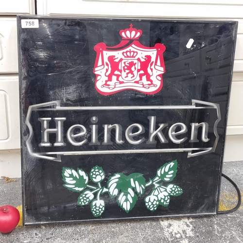 758 - A large Heineken light up sign. Tested and working.