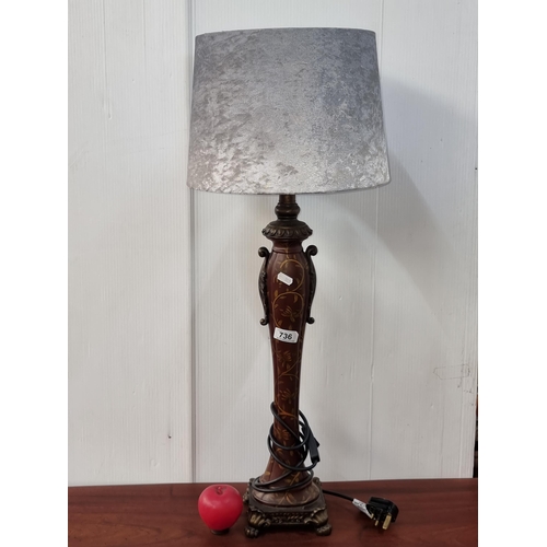 736 - A tall hand painted table lamp with claw foot base.