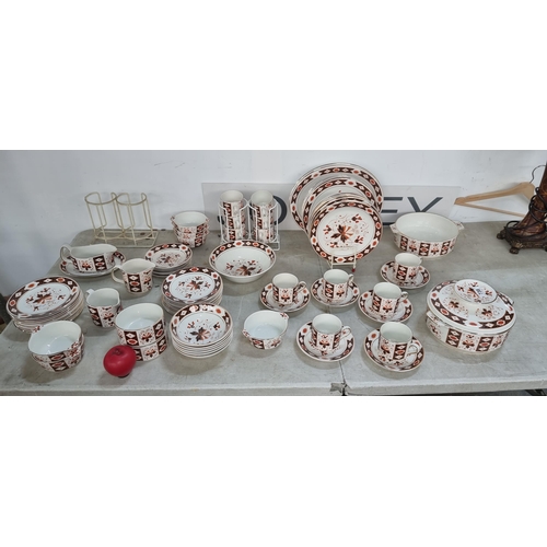 738 - A large dinner service of Arklow Irish pottery in the Kildare pattern. Includes large and small dinn... 