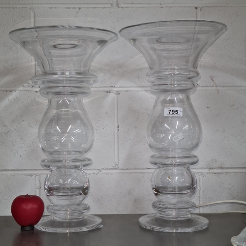 795 - A pair of glass table vases inspired by the popular bohemian trend, ideal for displaying fresh or dr... 