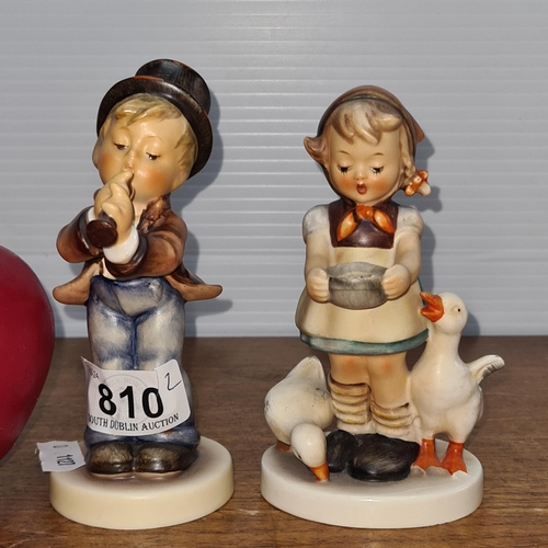 810 - Two very sweet west German Goebel Hummel figures, one of a little girl feeding geese and a little bo... 