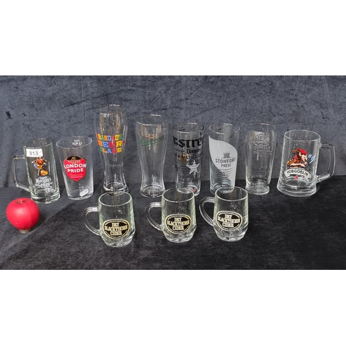 813 - A collection of 11 branded pub glassware including three Dry Blackthorn Cider glass tankards, a Lond... 