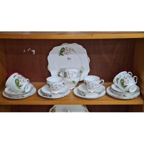 831 - A 20 piece Royal Stafford tea service, includes side plate, cups, saucers, milk jug and sugar bowl.