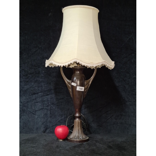 836 - A very elegant tall, heavy cold  bronze twin handled table lamp.