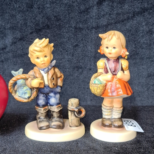 839 - Two adorable Goebel Hummel figures.