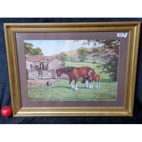 852 - A large print after a 'Ron Beaton' painting. Features a farm landscape with horses. Housed in a gilt... 