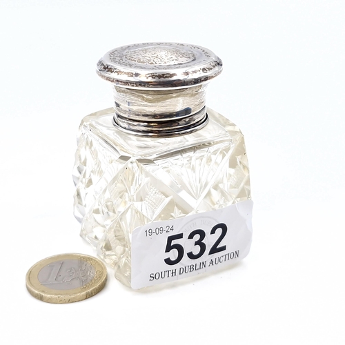 532 - A sterling silver topped hob nail cut glass perfume bottle with original stopper. Dimensions: 4 cms ... 