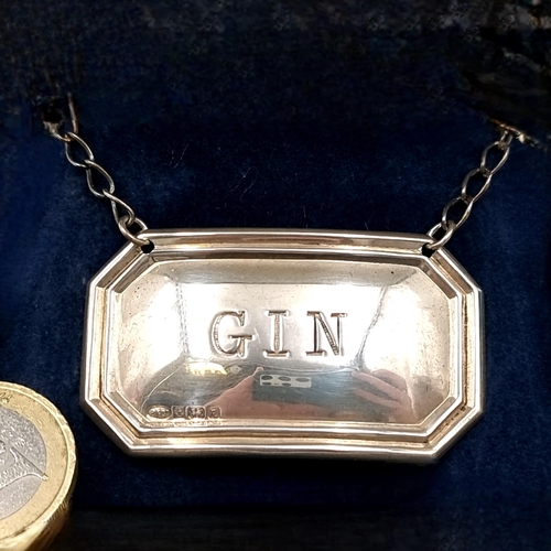 561 - A hallmarked sterling silver gin decanter/bottle label hallmarked Birmingham - 1991. Maker - W.I. Br... 