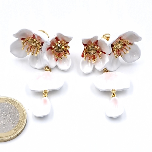 579 - A pair of lovely designer Les Néréides enamelled earrings.