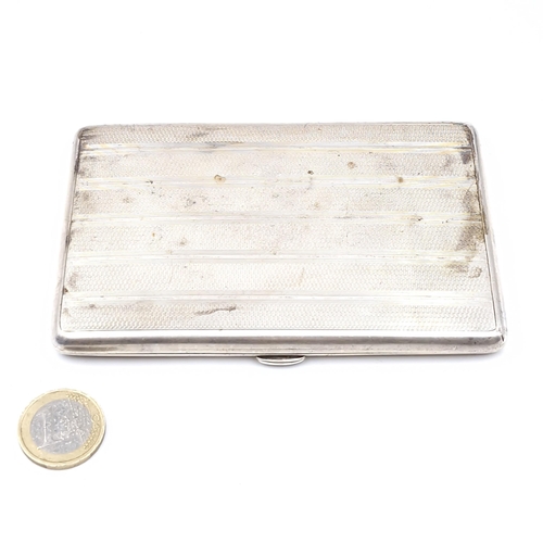 598 - A nice example of a sterling silver cigarette case with silver gilt interior hallmarked Birmingham d... 