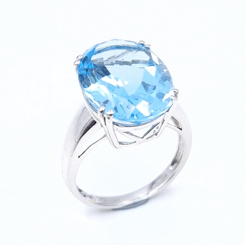 599 - Star Lot : A nice example of a huge blue topaz gemstone ring set in white gold (375). Ring size - Q.... 