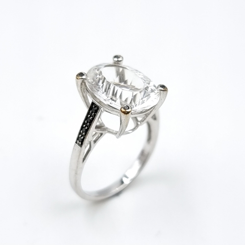 602 - Star Lot : A very attractive petalite ring set in nine carat white gold. Est. weight of stone - 4.26... 