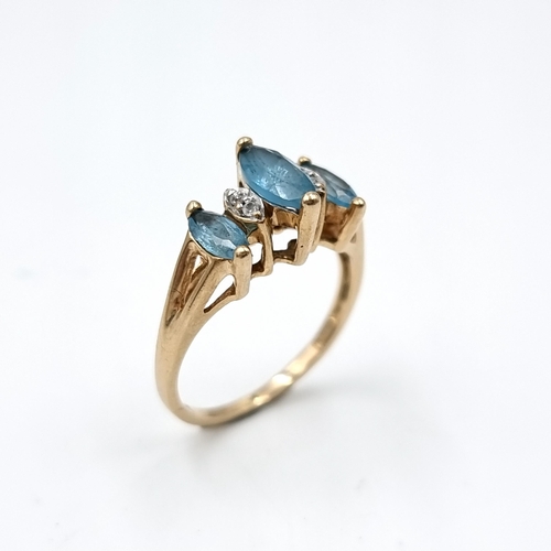 607 - Star Lot : An unusual vintage  diamond and aquamarine vintage ring set in 10 carat gold marked '10K'... 