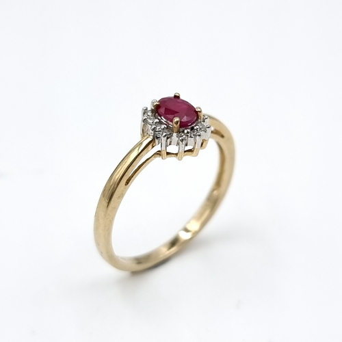 609 - Star Lot : A diamond and ruby c ring set in nine carat gold (375). Ring size - Q. Weight - 1.91 gram... 