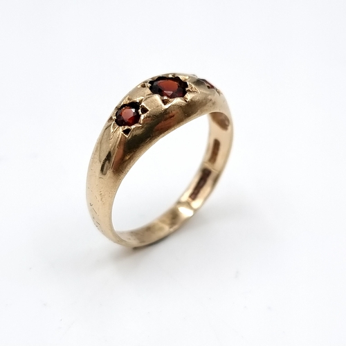 610 - A large heavy vintage  garnet stone vintage ring hallmarked 375. Ring size - U. Weight - 3.36 grams.... 