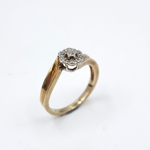 613 - Star Lot : A vintage diamond ring with twist mount set in nine carat gold (375). Ring size - N. Weig... 