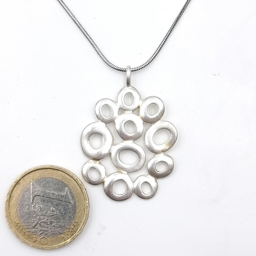 620 - A lovely Sterling silver necklace with abstract pendant by John Rocha. Stamped.
Total length of chai... 