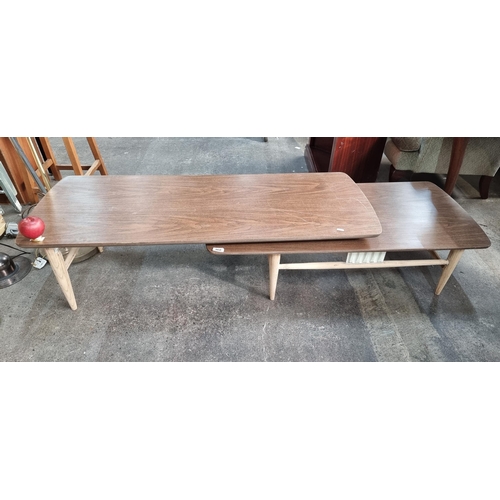 960 - A unique retro style swivel  mid century modern coffee table with and painted frame and tapered legs... 