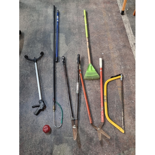 966 - A selection of quality gardening tools including two sheers.