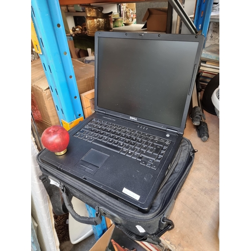 974 - A Dell Inspiron 2200 laptop complete with nylon carrier case. No cables included. Untested.