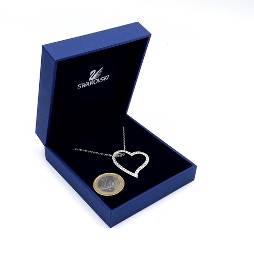 993 - A brand new Swarovski Crystal Necklace with a large heart shaped pendant. Housed in original box and... 