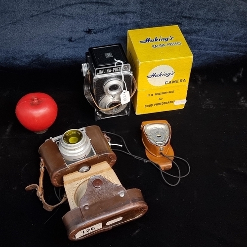 126 - A lot of vintage items including a Zeiss lens 35mm camera, a pulling optics exposure meter, and a Ha... 