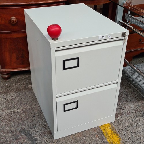 927 - A good sized two drawer filing cabinet complete with original locking key. Comes with spare key also... 