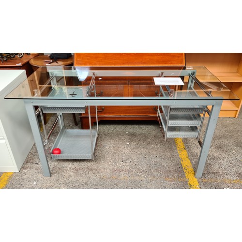 929 - A robust and industrial style office desk with five shelves, glass top and metal frame.