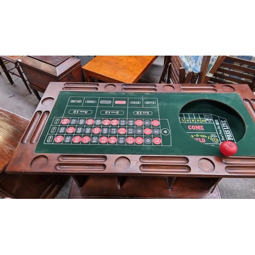 1047 - Star lot : Vintage wooden gaming table with craps, roulette  and blackjack layouts. Features multipl... 