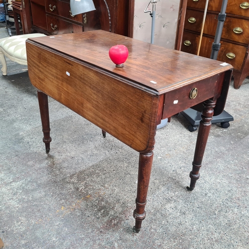 1075 - Star Lot : A fabulous Victorian Mahogany Drop Leaf table. Features a neatly sized pull out drawers t... 